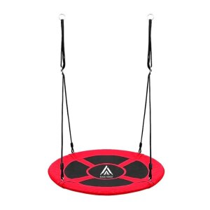 Red nest swing Black Forest SW100X in the garden, 100 cm diameter, for children.