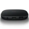 Compact Xiaomi TV Box S (3rd Gen) next to a TV displaying the Google TV interface.