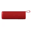 Red Xiaomi Sound Outdoor speaker with 30W power by the pool, showing its IP67 waterproof rating.