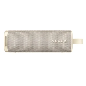Golden Xiaomi Sound Outdoor Bluetooth speaker from the front, showing the rugged housing and controls.