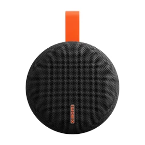 Compact Xiaomi Bluetooth Speaker Essential in black with a fabric cover on a white background.