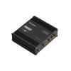 Teltonika TRB501 5G Gateway im industriellen Einsatz, montiert in einem Schaltschrank für die Maschinenfernsteuerung mit niedriger Latenz.